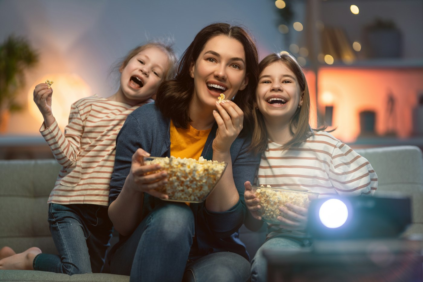 Family watching a home movie together
