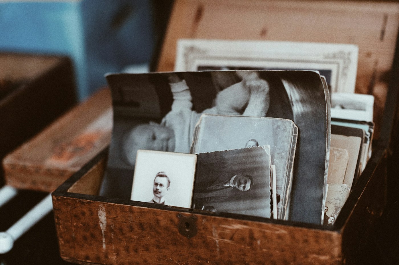 Old photographs in a wooden box